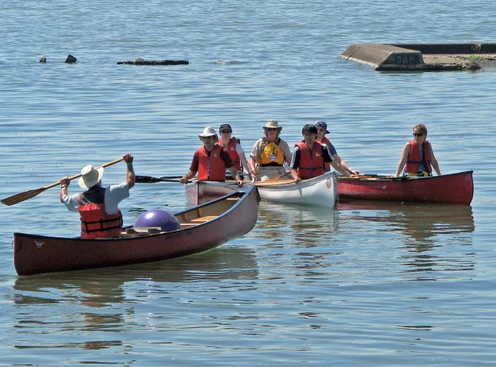 Teaching canoeing at Sunnyside Beach in Toronto